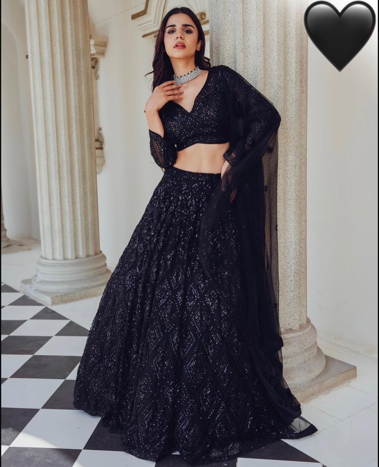 Black designer lehenga choli with 3.5 meter flare and can can detail - WishTown Fashion Club