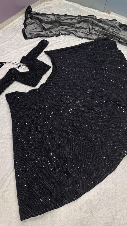 Black festive wear lehenga with unstitched embroidered blouse and net dupatta - WishTown Fashion Club