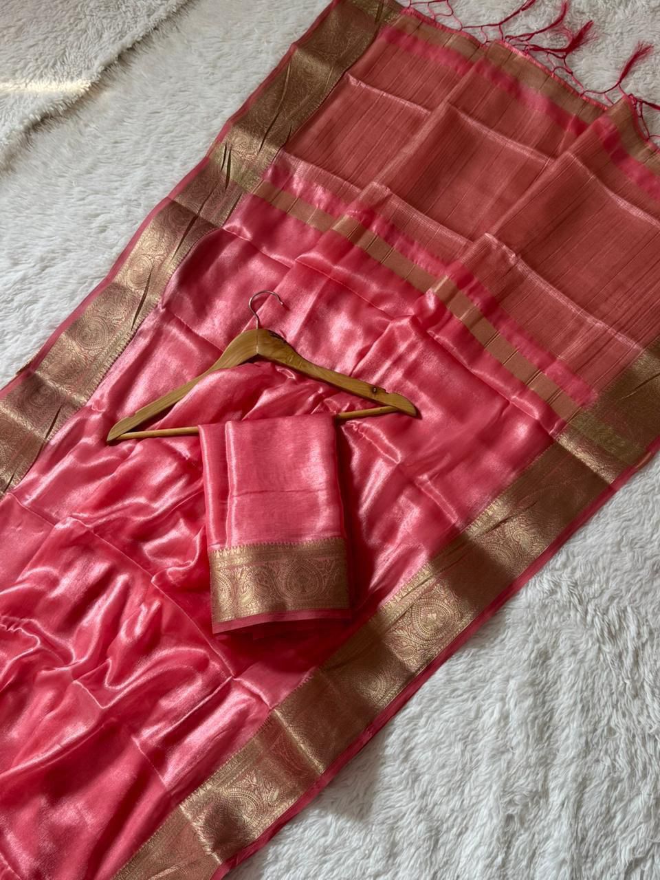 Elegant peach pink soft Space Silk saree featuring shimmering finish and rich zari pallu paired with matching running blouse – WishTown Fashion Club