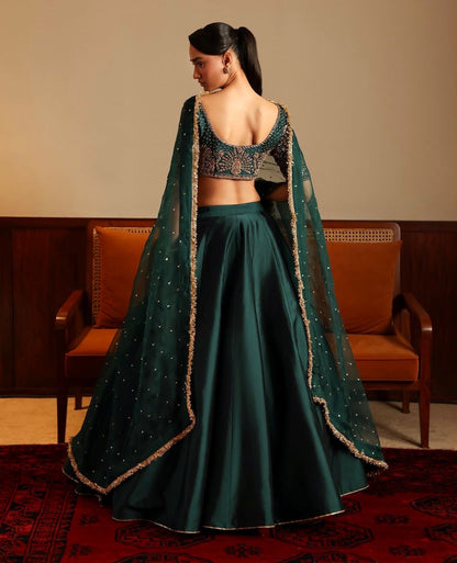 Women’s green satin lehenga set featuring sequins and zari embroidered blouse with stone-work dupatta – WishTown Fashion Club