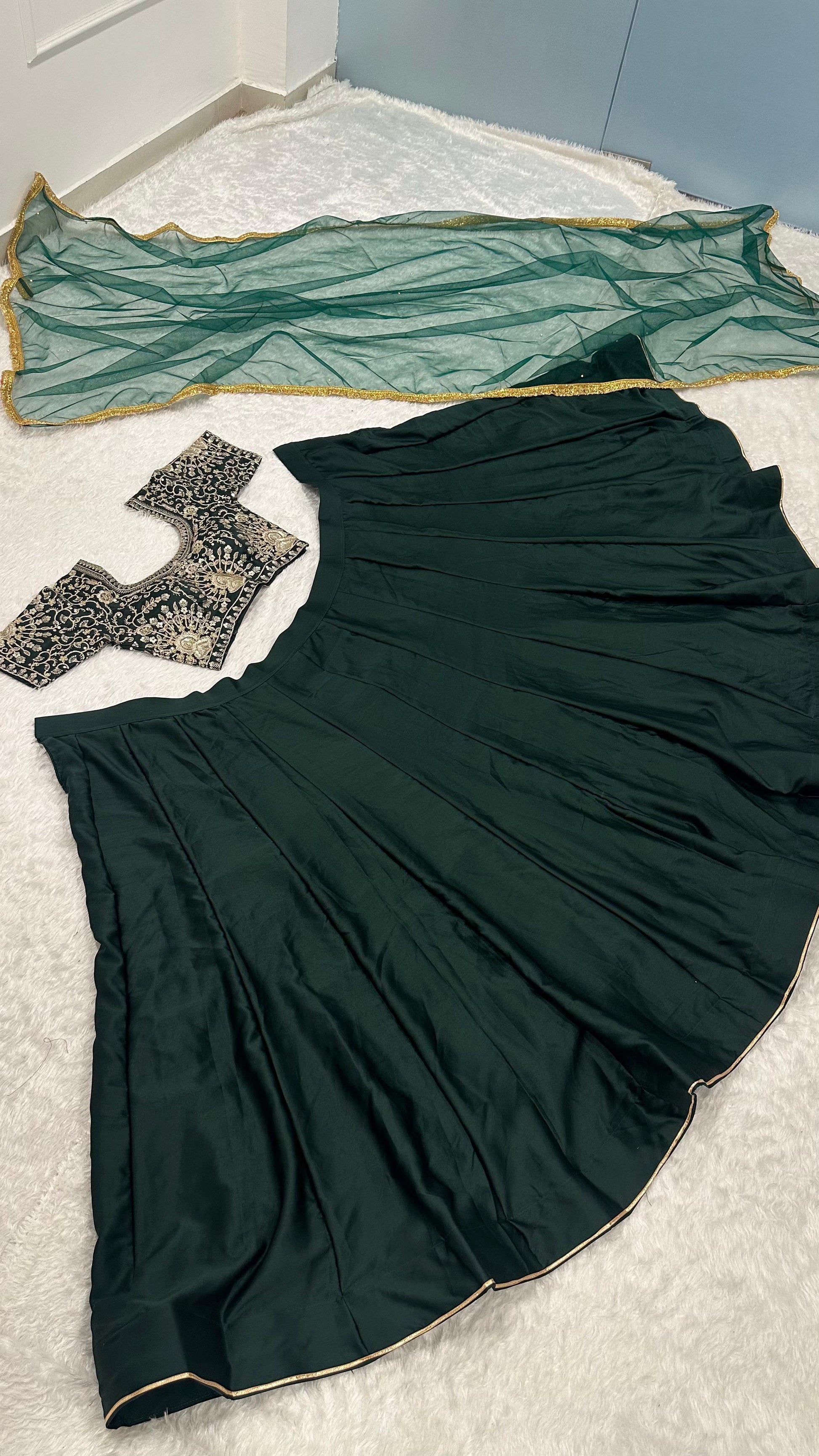 Festive green lehenga set featuring satin flair skirt, embroidered blouse and embellished net dupatta – WishTown Fashion Club