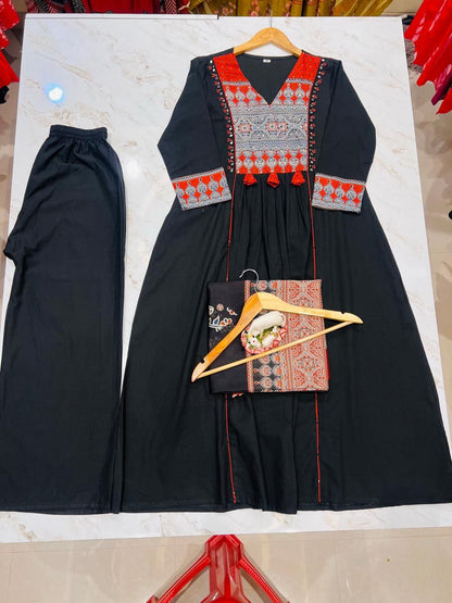 Black ethnic cotton kurti with handcrafted mirror work detail close-up - WishTown Fashion Club