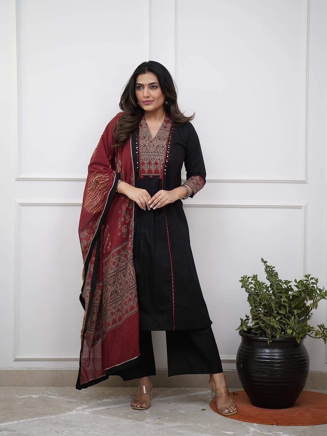 Black cotton A-line kurti with hand mirror and katha work yoke front view - WishTown Fashion Club