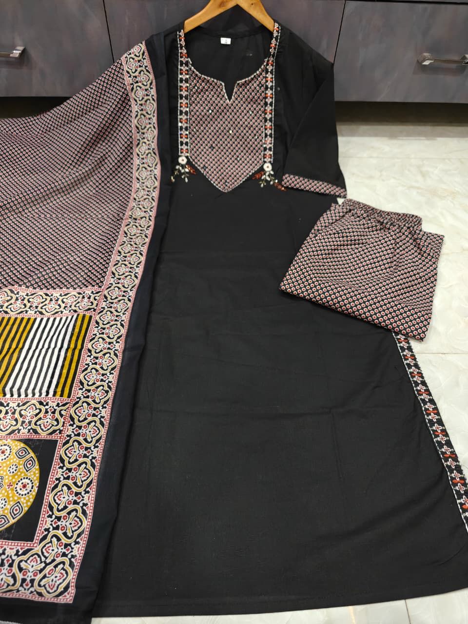 Black embroidered cotton kurti with palazzo and malmal dupatta front view - WishTown Fashion Club