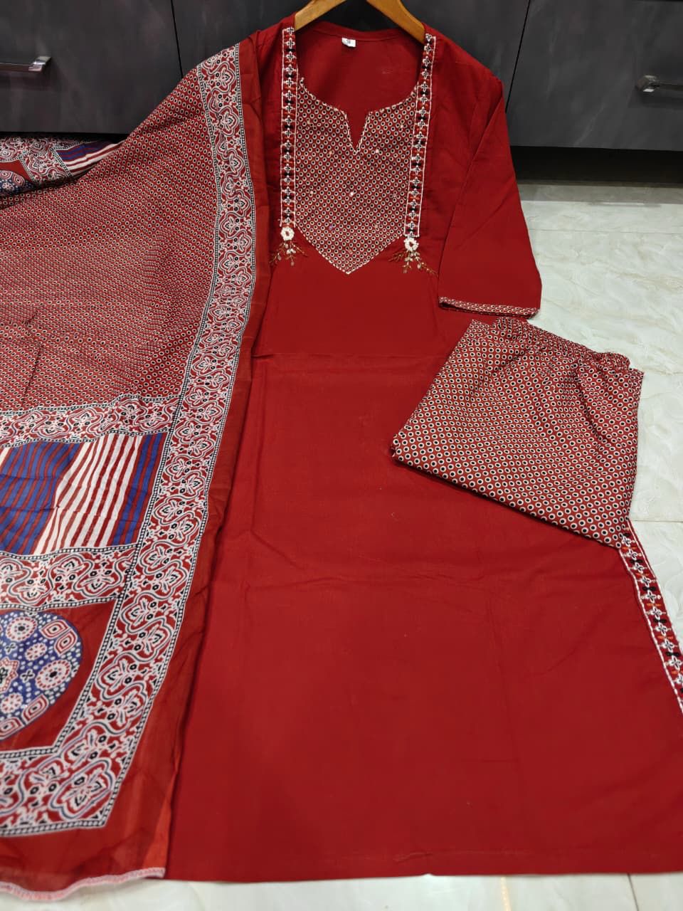 Maroon embroidered cotton kurti with palazzo and malmal dupatta front view - WishTown Fashion Club