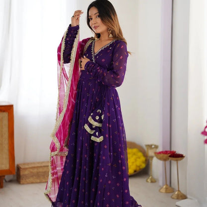 Purple faux georgette Anarkali gown with embroidered neckline front view - WishTown Fashion Club