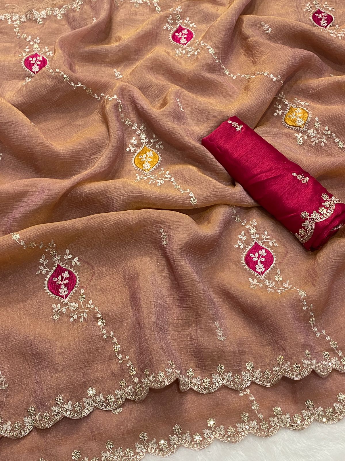 Rust designer saree with contrast embroidered blouse and rich drape - WishTown Fashion Club