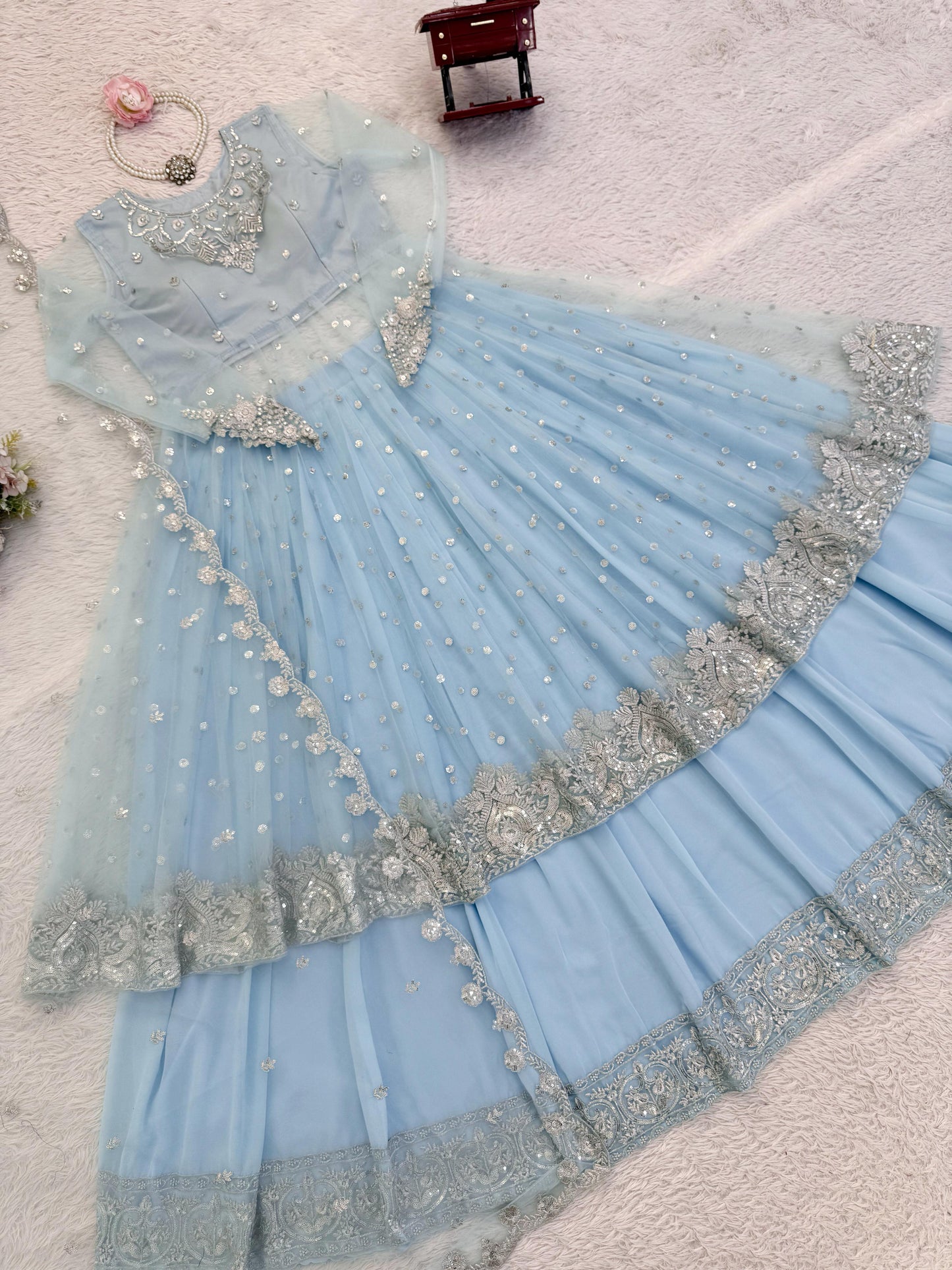 Sky blue party wear ethnic outfit showing fabric texture and embroidery - WishTown Fashion Club
