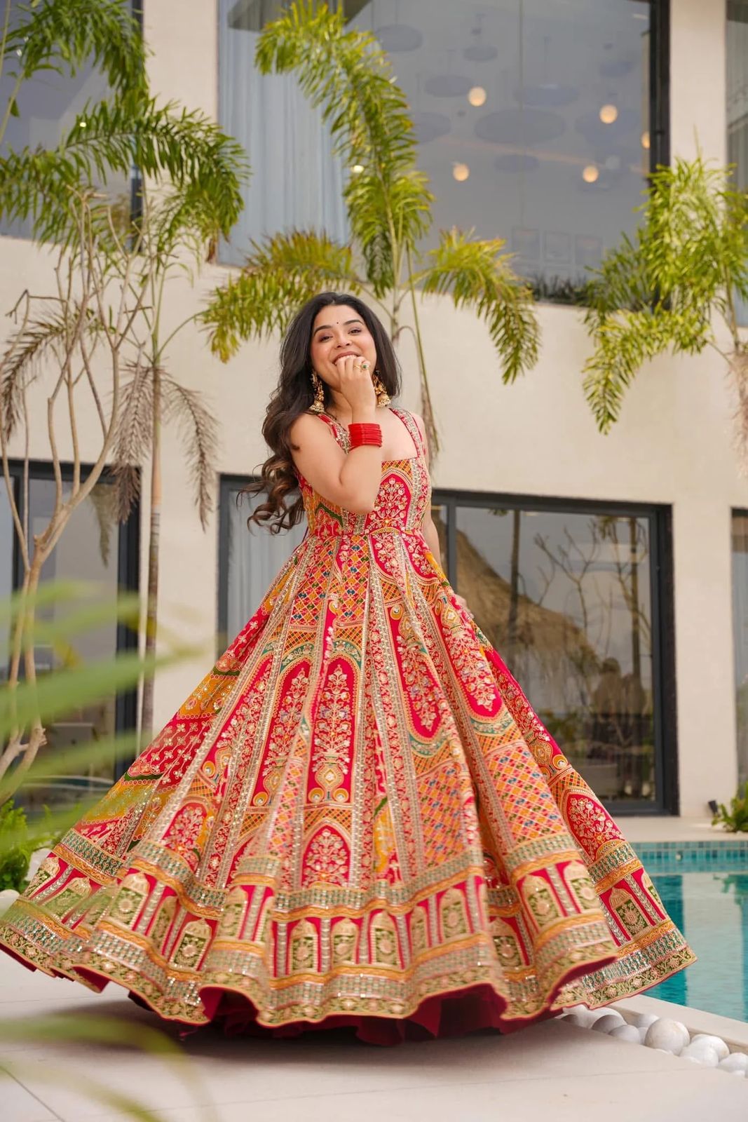 Red organza Anarkali gown with huge flair festive wear - WishTown Fashion Club