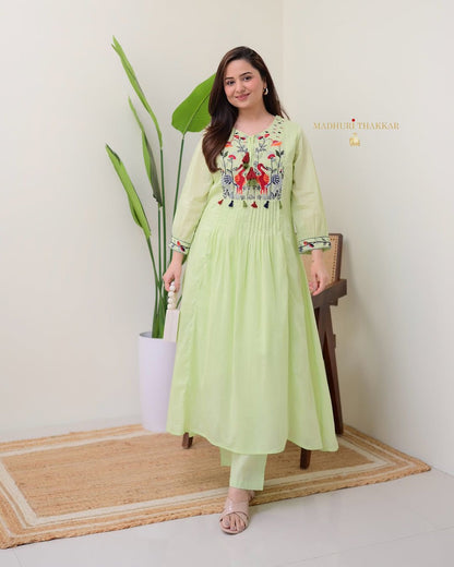 Light green cotton 60x60 kurti pant set with pintex and embroidered yoke - WishTown Fashion Club