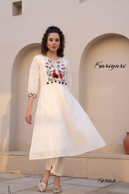 White premium cotton kurti with pintex detailing and straight pant - WishTown Fashion Club