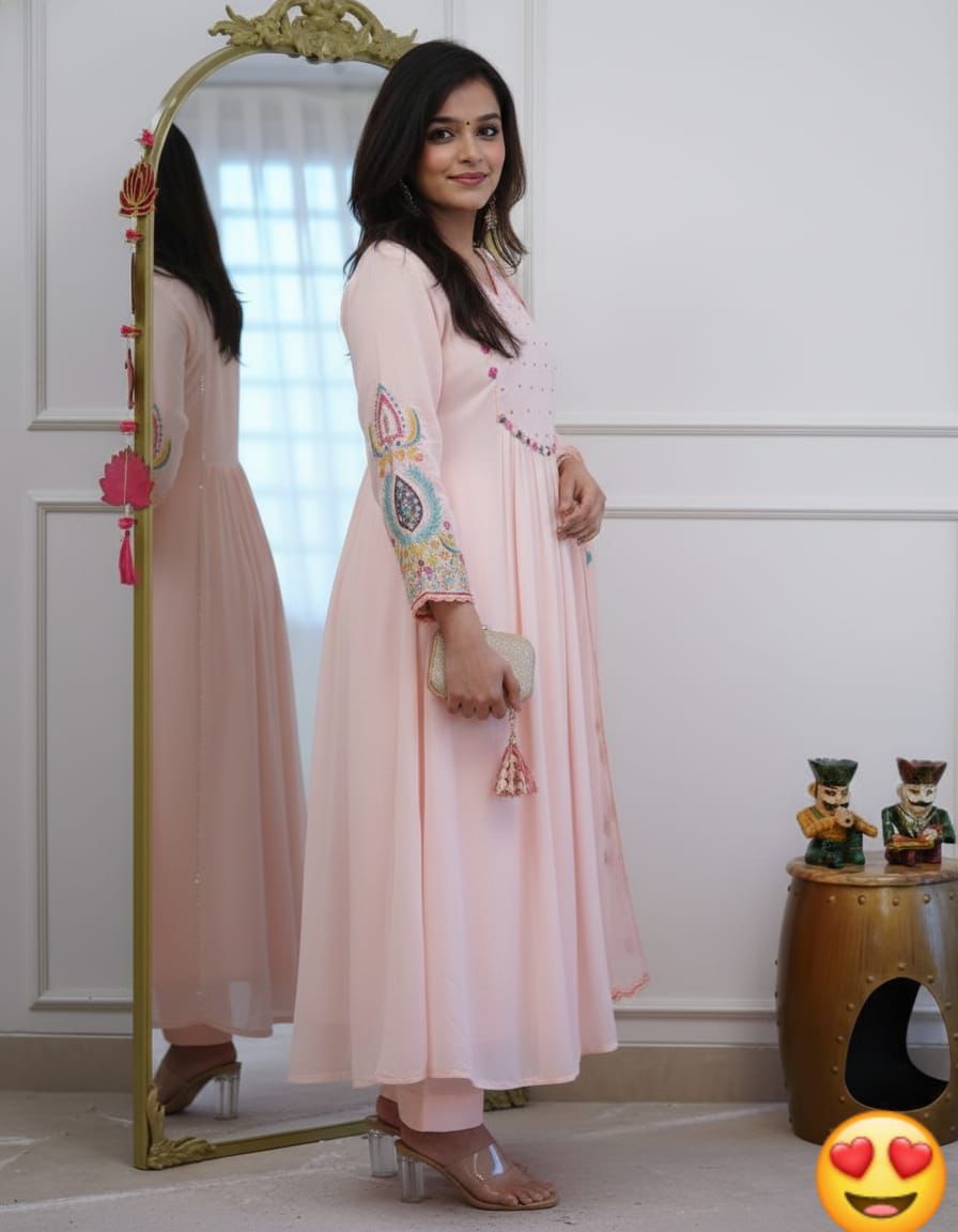 Light pink cotton flared kurta set with detailed neckline embroidery - WishTown Fashion Club