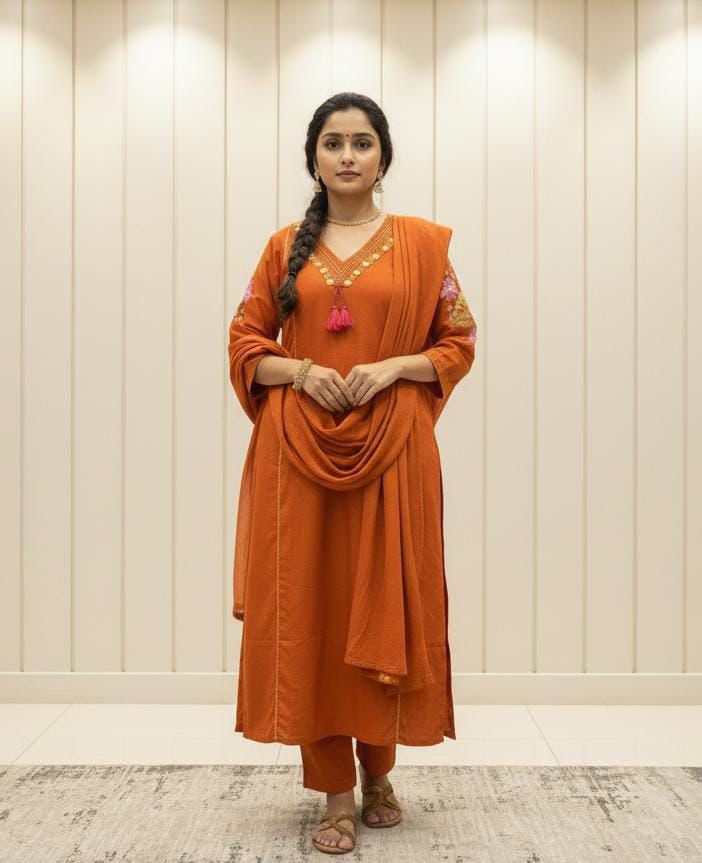 Orange cotton straight suit set with embroidered V-neck kurta front view - WishTown Fashion Club