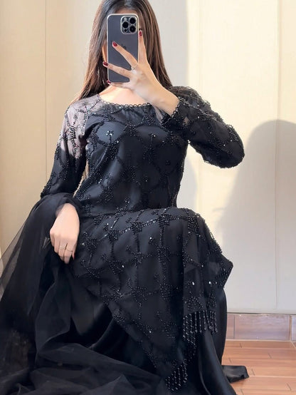 Black designer party wear ethnic suit with pearl moti embroidery front view - WishTown Fashion Club
