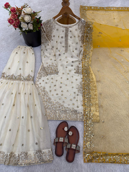 Yellow Pure Fendy silk embroidered gharara set with heavy sequence work front view - WishTown Fashion Club