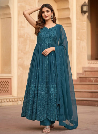 Teal blue heavy faux georgette designer suit with chine sequins work front view - WishTown Fashion Club
