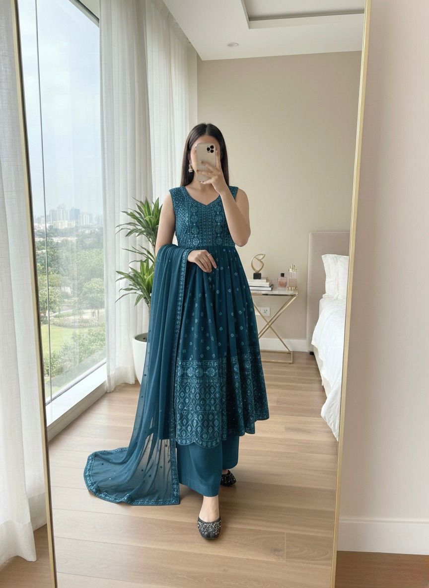 Teal blue fancy cut top with palazzo and dupatta party wear look - WishTown Fashion Club
