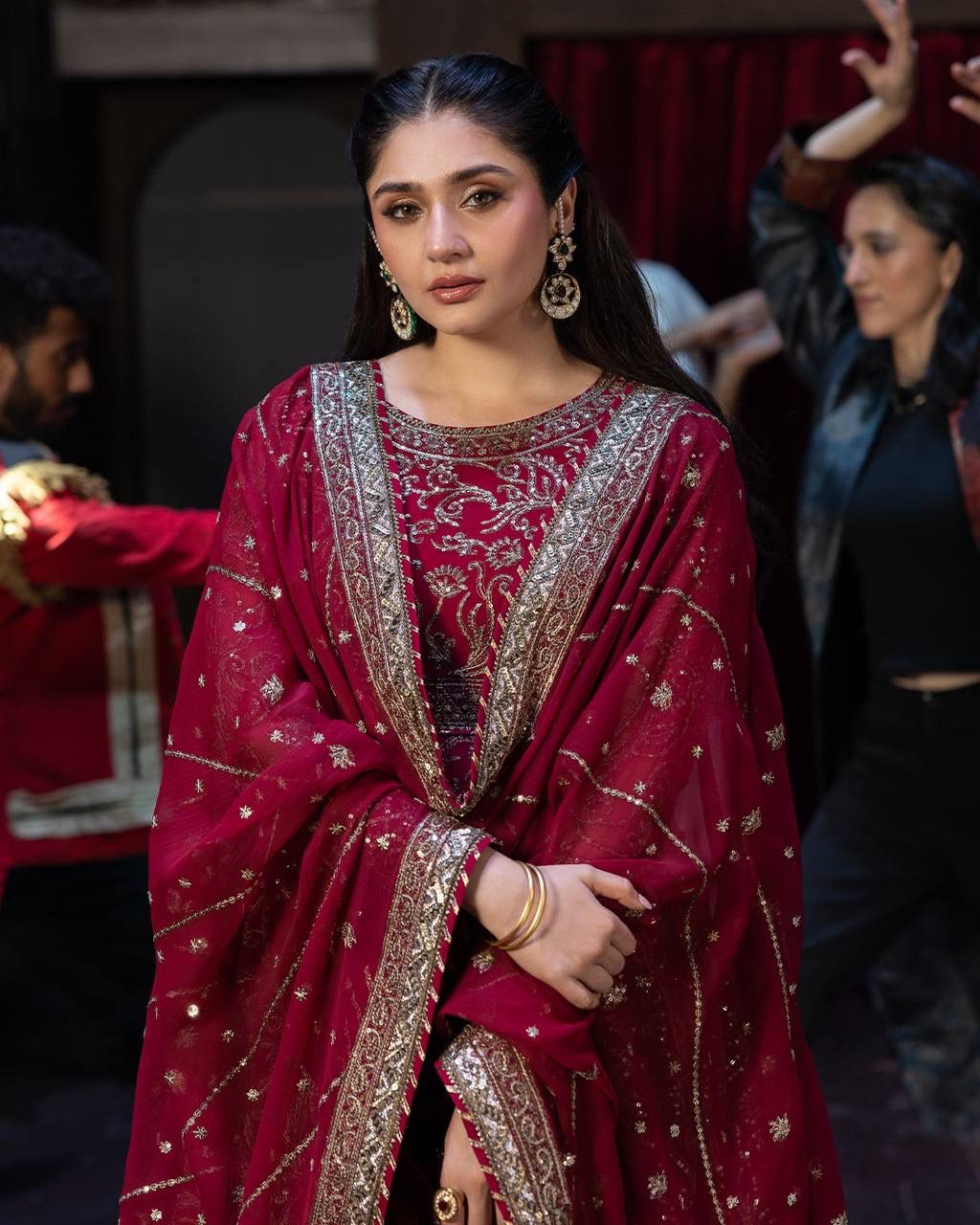 Maroon designer party wear gown with heavy sequence embroidery work close up - WishTown Fashion Club