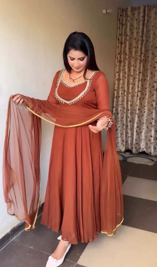 Brown fox georgette designer gown pant and dupatta set with hand work moti lace detailing front view - WishTown Fashion Club