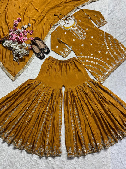 Designer mustard yellow embroidered sharara suit back view elegant festive ethnic outfit - WishTown Fashion Club