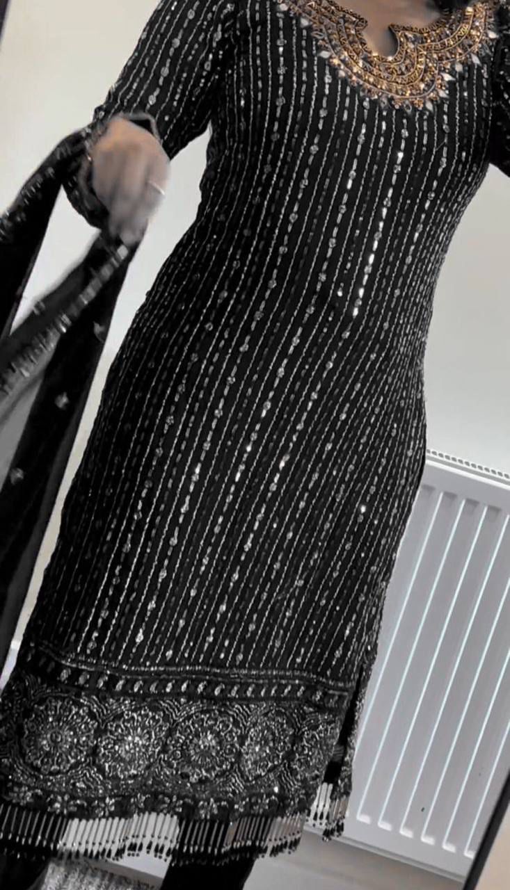 Black embroidered ethnic suit closeup showing real mirror work and thread detailing premium designer wear - WishTown Fashion Club