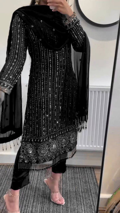 Black faux georgette embroidered suit set with real mirror work and latkan designer ethnic wear front view - WishTown Fashion Club