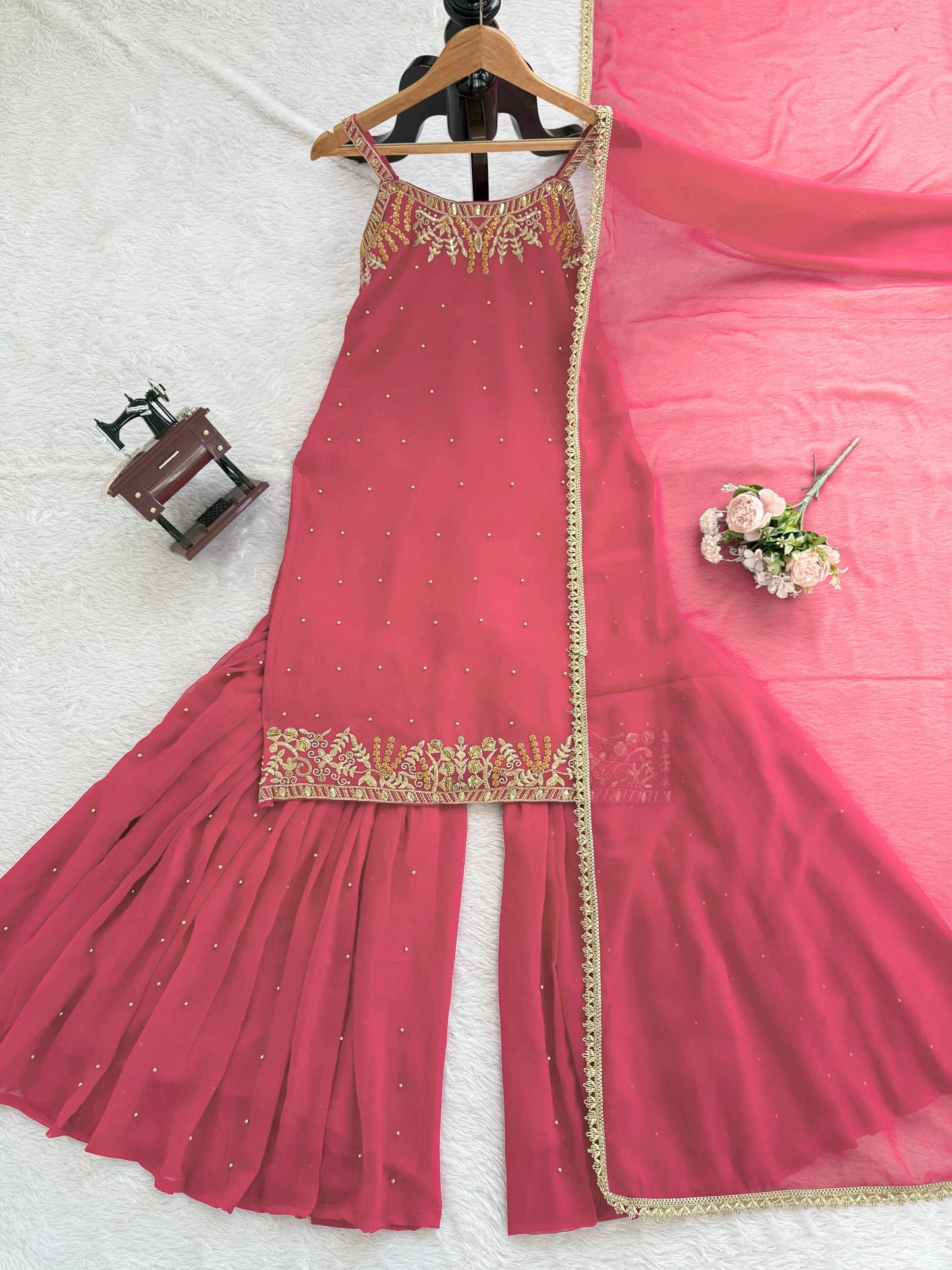 Light pink faux georgette sharara set with elegant embroidery - WishTown Fashion Club
