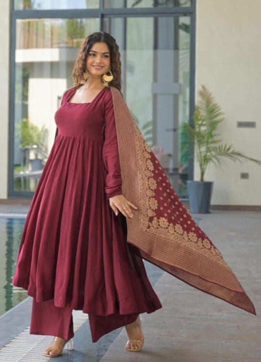 Maroon cotton Anarkali deep neck kurti with tassels and dori detailing paired with cotton pant and Banarasi Chanderi dupatta - WishTown Fashion Club