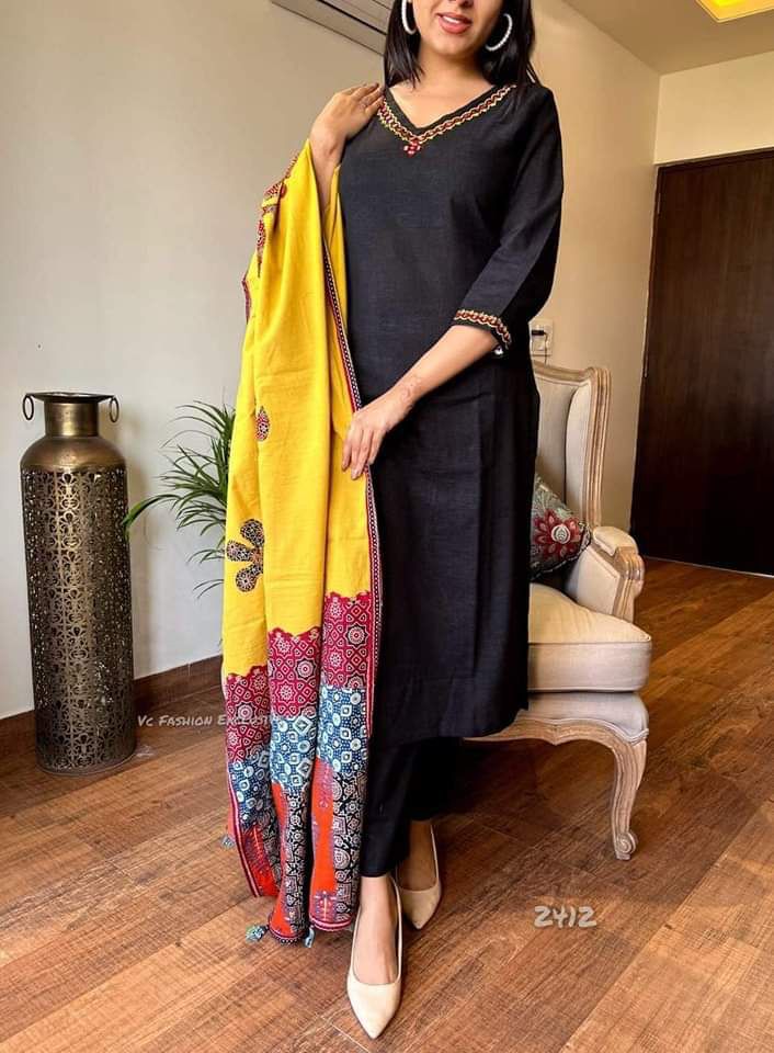 Black cotton kurti with rich embroidery and button detailing close up - WishTown Fashion Club