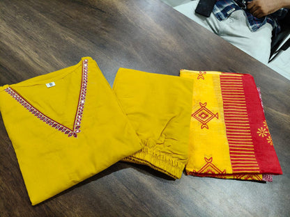 Yellow festive wear cotton suit with 46 inch long kurti elegant pose - WishTown Fashion Club