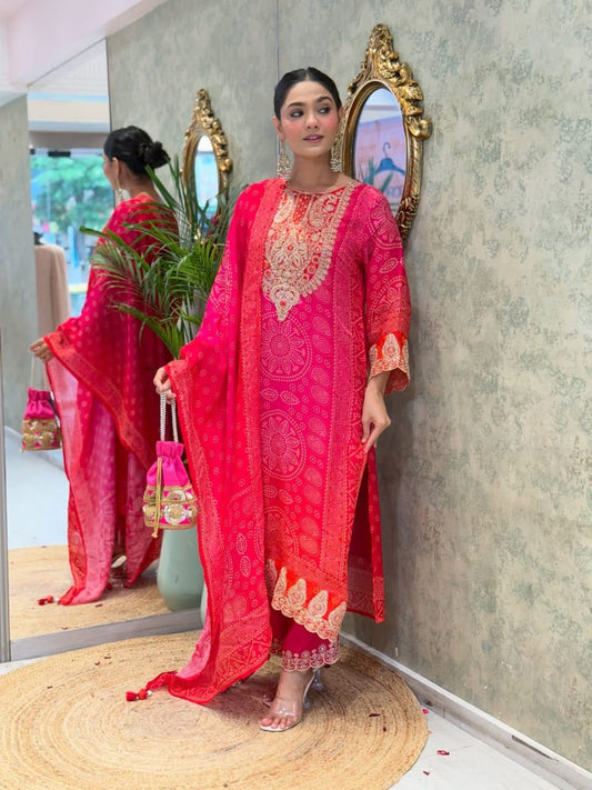 Dark pink heavy Kitkat silk suit set with full neck coding embroidery and matching pant - WishTown Fashion Club