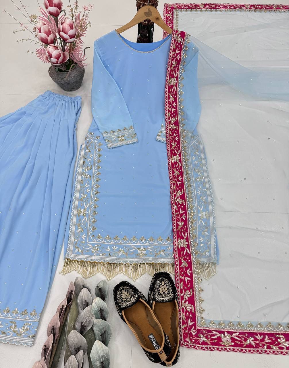 Sky blue festive ethnic suit with embroidered georgette top and flared farshi plazzo - WishTown Fashion Club