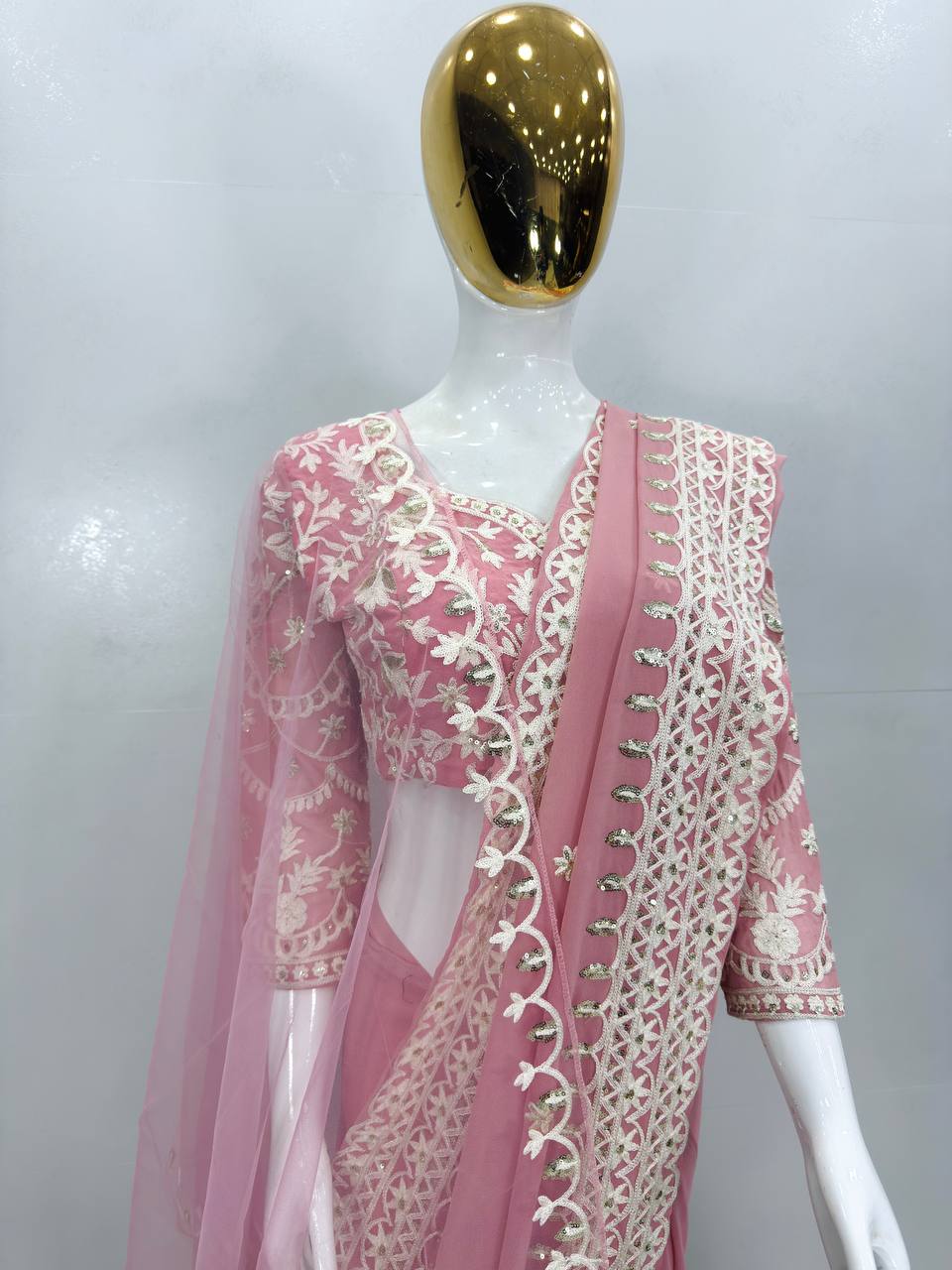 Off pink elegant faux georgette saree with embroidered net dupatta full look - WishTown Fashion Club