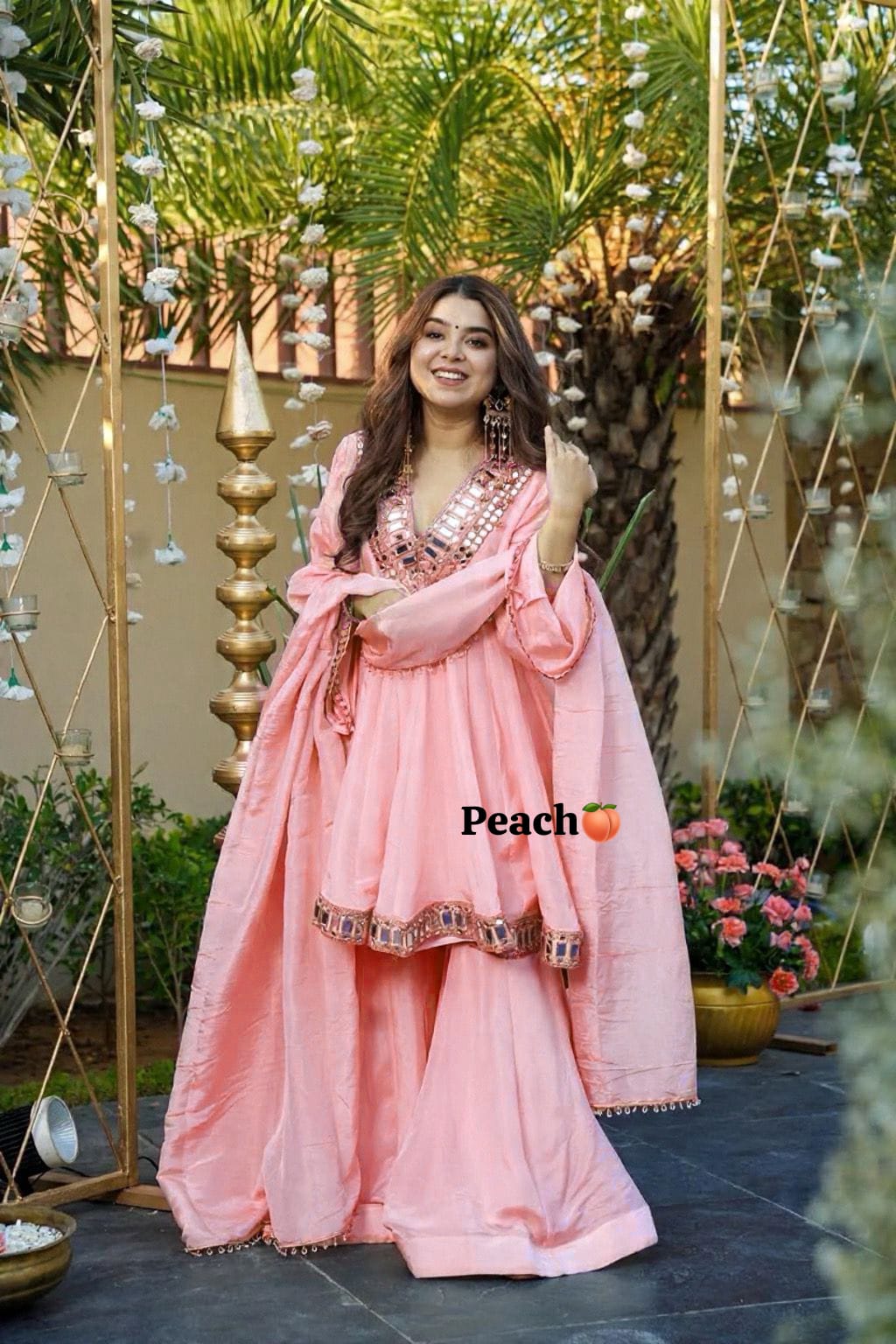 Peach Chinon silk peplum dress with mirror work yoke and flared gharara - WishTown Fashion Club