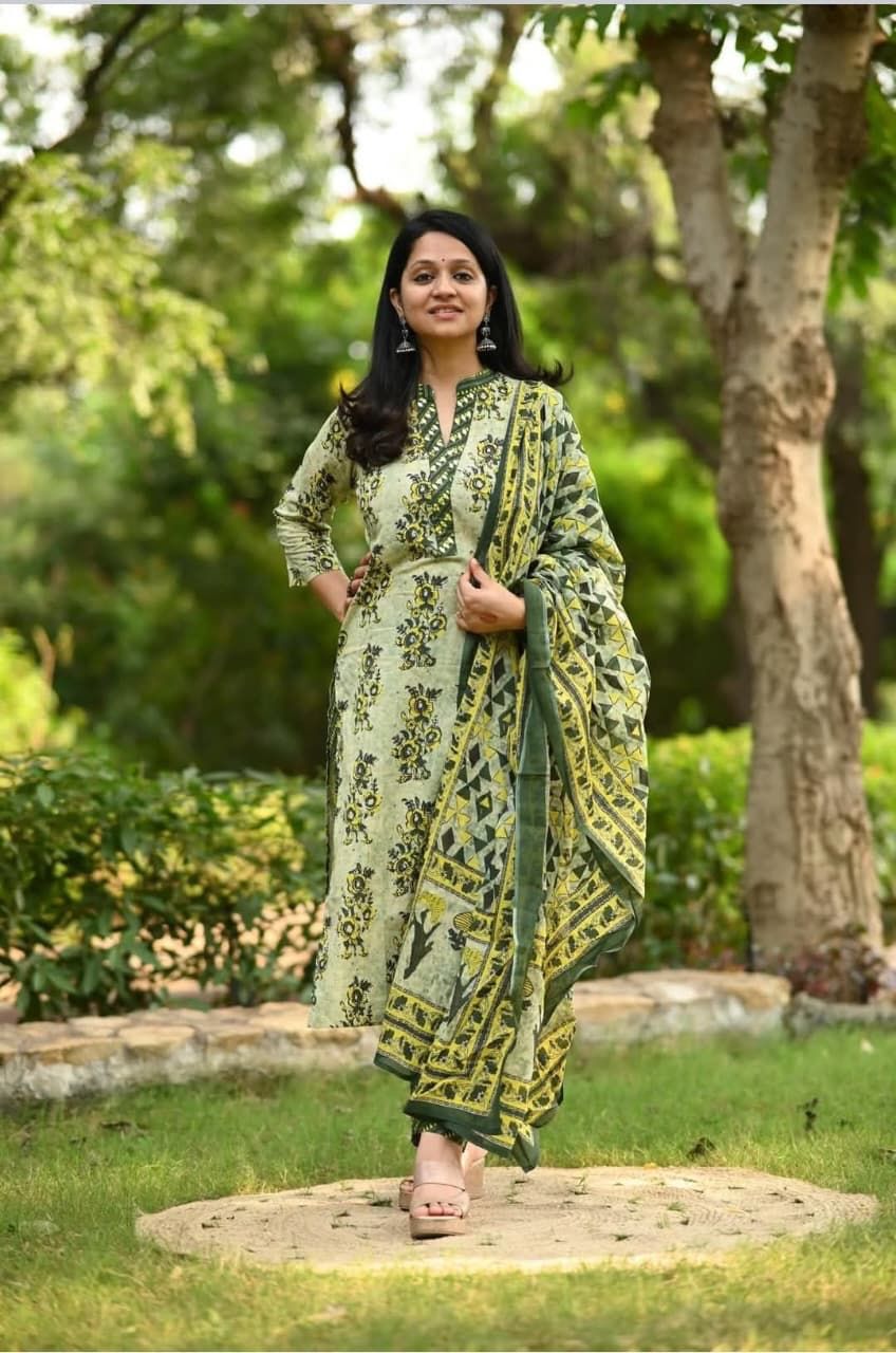 green suit set with floral and geometric prints straight kurta and striped pants - WishTown Fashion Club
