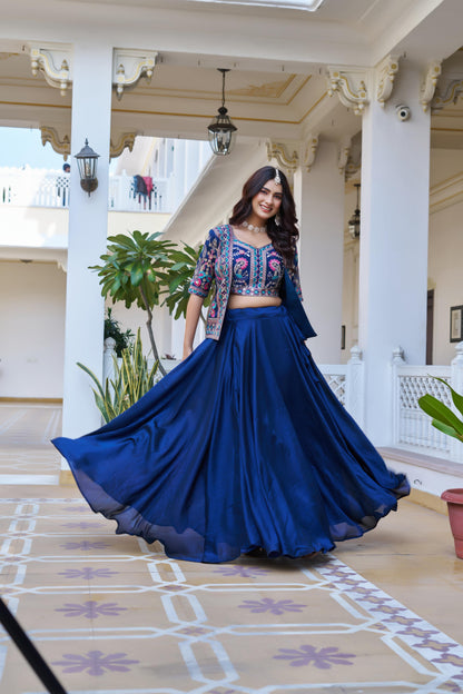 Premium navy blue three piece festive dress set featuring heavy thread decorations on smooth material.