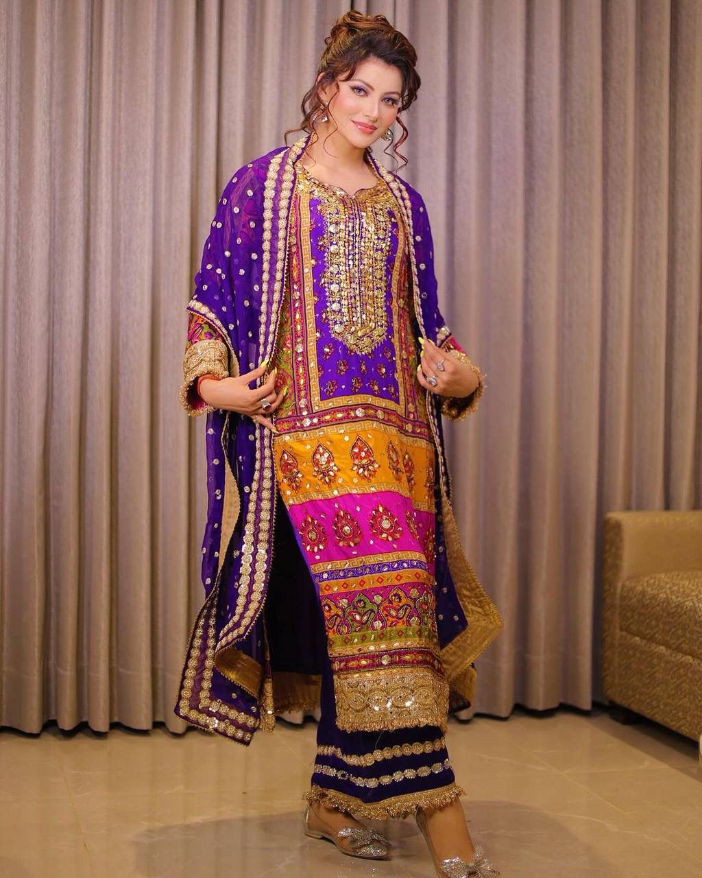Front view of full three piece purple festive ethnic outfit showcasing a long digital print top and matching wide leg silk trousers.