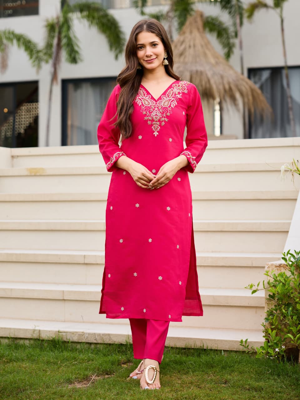 Complete flat layout presentation of the pink designer suit set displaying the three pieces including the top pants and long scarf.