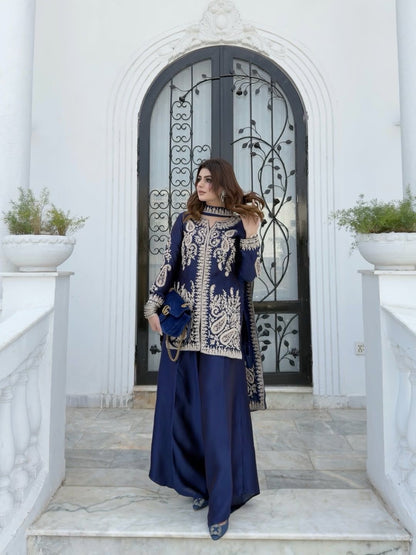 Flat layout display of the designer navy blue ethnic set highlighting the three component pieces including top pants and long scarf.