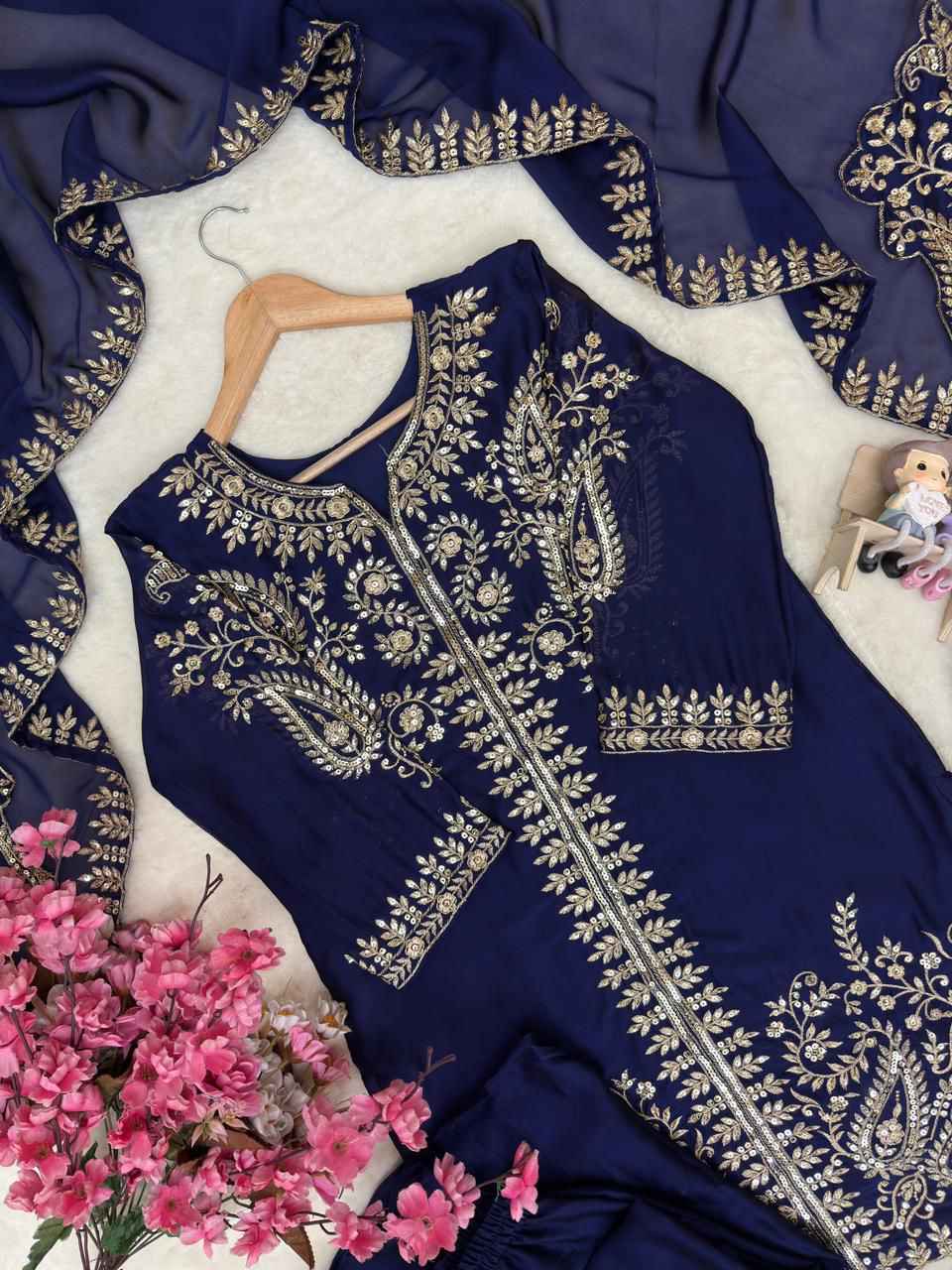 Side perspective of the fully stitched navy blue traditional suit highlighting the regular straight silhouette and smooth texture.