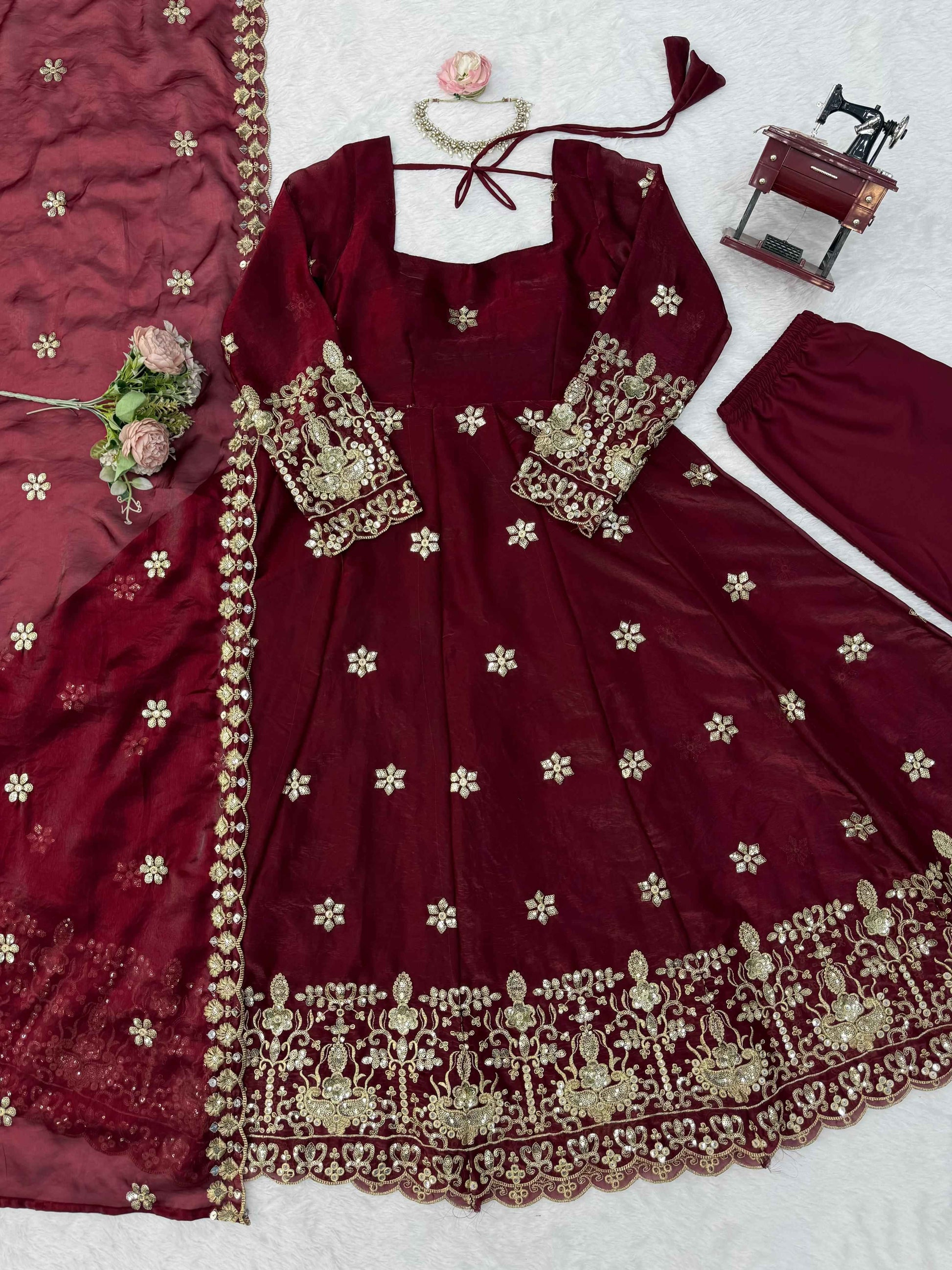Back angle presentation of a fully stitched maroon festive outfit showing clean tailored seams and a comfortable micro cotton lining.
