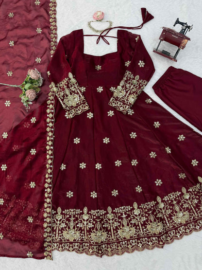 Back angle presentation of a fully stitched maroon festive outfit showing clean tailored seams and a comfortable micro cotton lining.