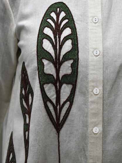 Back angle presentation of the green cotton flex top showing the continuous solid color layout and clean seamless structure lines.