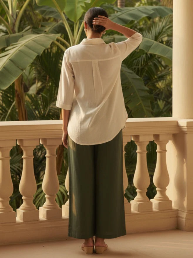 Detailed front view of the green matching trousers showcasing the comfortable waist area and straight leg opening tailoring.