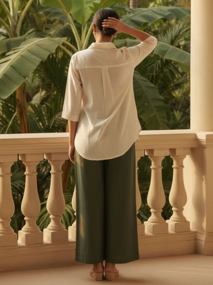 Detailed front view of the green matching trousers showcasing the comfortable waist area and straight leg opening tailoring.