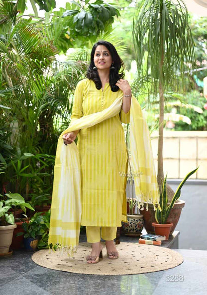 Front view of full three piece yellow south cotton handloom kurta set displaying a weaving cotton tunic straight pants and matching dupatta.