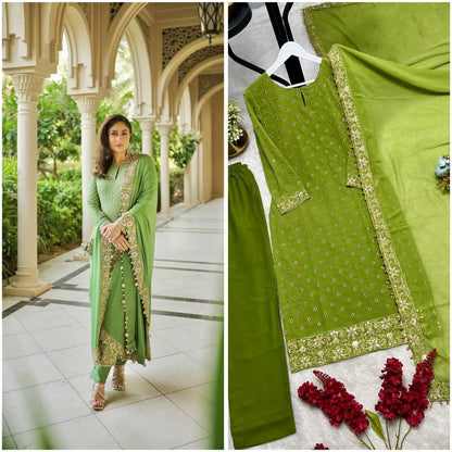 Close up view of detailed attractive embroidery sequence and fine thread work patterns on a vibrant green georgette bodice.