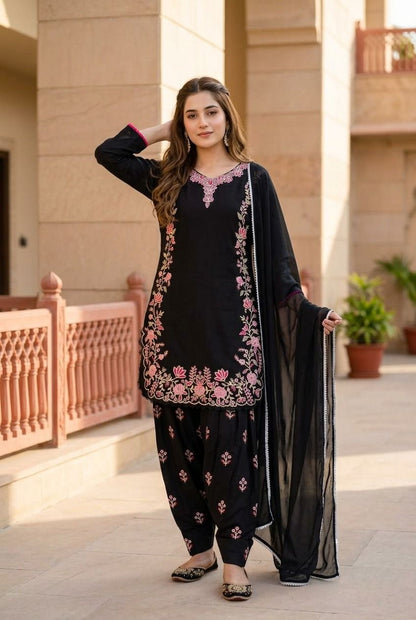Complete flat layout presentation of the black designer suit set displaying the three separate garment pieces including top pants and long scarf together.