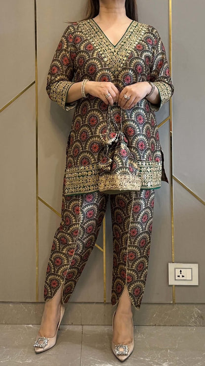 Back angle presentation of the maroon printed mul cotton tunic showing the continuous ethnic print layout and clean tailored seamless seams.