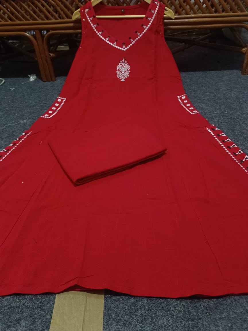 Maroon Image 3 Alt Text: Detailed shot of the maroon kurti side pocket displaying the fine complementary embroidery work around the pocket opening.